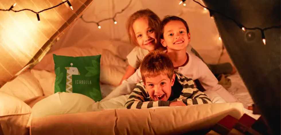 Plan an epic backyard campout with personalized pillows, blankets, and more!