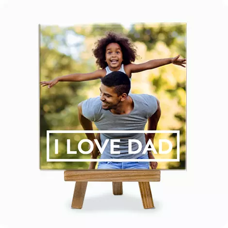 Photo tile with father and two children