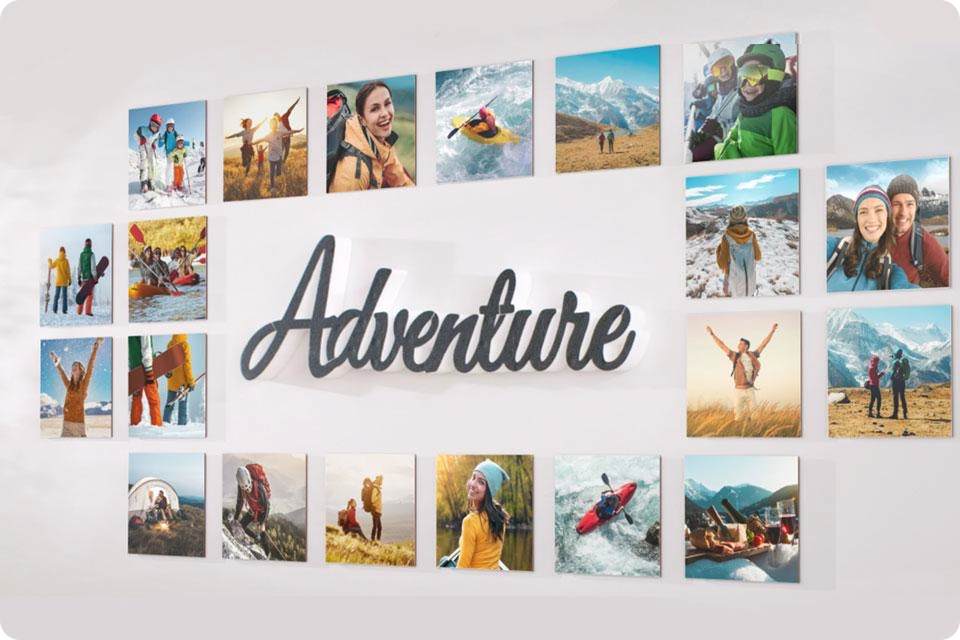 Multiple Snapfish Photo Tiles featuring vacation photos are displayed around the word adventure on a wall 